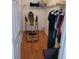 Well-organized walk-in closet with ample storage space for clothes, accessories, and fitness equipment at 527 San Pedro Dr, The Villages, FL 32159