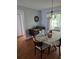 Dining room showcasing a formal dining table and chandelier at 527 San Pedro Dr, The Villages, FL 32159
