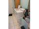 Functional laundry room with washer, dryer, and storage, offering convenience and organization at 527 San Pedro Dr, The Villages, FL 32159