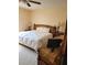 Spacious main bedroom with comfortable furnishings and ample natural light, perfect for relaxation at 527 San Pedro Dr, The Villages, FL 32159