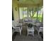 Inviting sunroom with wicker seating, perfect for relaxation at 527 San Pedro Dr, The Villages, FL 32159
