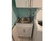 Close-up of utility sink with a modern faucet and white cabinet at 527 San Pedro Dr, The Villages, FL 32159