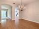 Spacious dining room with hardwood floors and views to Gathering room at 235 Anastasia Dr, Poinciana, FL 34759