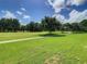 Panoramic view of a well-manicured golf course at 235 Anastasia Dr, Poinciana, FL 34759