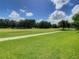 Scenic view of a lush green golf course at 235 Anastasia Dr, Poinciana, FL 34759