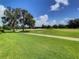 Expansive golf course view with lush greens at 235 Anastasia Dr, Poinciana, FL 34759