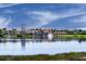 Luxury community with lake, clubhouse, and fountain at 235 Anastasia Dr, Poinciana, FL 34759