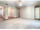 Large living room with carpet flooring and views to other rooms at 235 Anastasia Dr, Poinciana, FL 34759