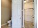 Spacious walk-in closet with ample shelving at 235 Anastasia Dr, Poinciana, FL 34759