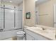 Clean bathroom with tub shower combo and vanity at 5144 Oakbourne Ave, Davenport, FL 33837