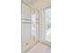 Shower with glass enclosure and tiled walls at 5144 Oakbourne Ave, Davenport, FL 33837