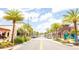 Attractive community street lined with palm trees and shops at 2968 Salted Rim Rd, Kissimmee, FL 34747