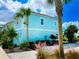 Exterior view of a charming light blue house at 2968 Salted Rim Rd, Kissimmee, FL 34747