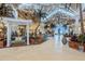 Resort lobby with tropical plants and unique light fixtures at 2968 Salted Rim Rd, Kissimmee, FL 34747