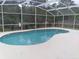 Refreshing kidney-shaped pool, screened patio at 2863 Picadilly Cir, Kissimmee, FL 34747