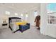Spacious main bedroom with a plush bed, window seating, and lots of natural light at 7401 Levee Ln, Celebration, FL 34747