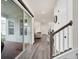 Bright entryway with sliding glass doors and hardwood floors at 7401 Levee Ln, Celebration, FL 34747