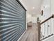 Entryway with modern blinds and hardwood flooring at 7401 Levee Ln, Celebration, FL 34747