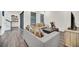 Living room with gray sectional sofa and wood coffee table at 7401 Levee Ln, Celebration, FL 34747
