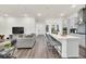Open concept living room and kitchen area at 7401 Levee Ln, Celebration, FL 34747