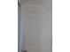 White interior door with raised panels and simple door hardware at 924 Derbyshire Dr, Kissimmee, FL 34758
