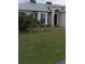 Front view of a single-story house with a well-maintained lawn at 924 Derbyshire Dr, Kissimmee, FL 34758