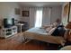 Main bedroom with a king-size bed and plenty of natural light at 924 Derbyshire Dr, Kissimmee, FL 34758