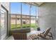 Enclosed lanai featuring a screen wall offering backyard views at 705 Ashton Dr, Davenport, FL 33837