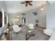 Bright living area with vaulted ceilings, elegant furnishings, and a modern open-concept design at 705 Ashton Dr, Davenport, FL 33837