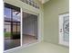 Covered patio showing a view of the open interior layout with outdoor access at 705 Ashton Dr, Davenport, FL 33837