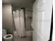Bathroom featuring a shower with white shower curtain at 14501 Grove Resort Ave # 1637, Winter Garden, FL 34787