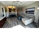 Bright living room with hardwood floors, modern furniture, and an open-concept design at 14501 Grove Resort Ave # 1637, Winter Garden, FL 34787