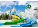 Exterior shot of the waterpark featuring slides and fountains at 14501 Grove Resort Ave # 1637, Winter Garden, FL 34787