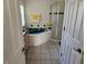 Bright bathroom showcasing a soaking tub with a shower, white tiles, and modern fixtures at 959 Nancy Ct, Kissimmee, FL 34759