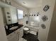 Clean bathroom with a tub shower combo and dark vanity at 2755 Monticello Way, Kissimmee, FL 34741