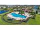 Community pool with surrounding landscaping at 2755 Monticello Way, Kissimmee, FL 34741