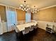 Elegant dining room with a large table and chandelier at 2755 Monticello Way, Kissimmee, FL 34741