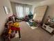 Playroom with toys, play area, and plenty of room at 2755 Monticello Way, Kissimmee, FL 34741