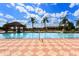 Inviting community swimming pool with lounge chairs at 301 Las Fuentes Dr, Kissimmee, FL 34746