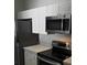 A well-equipped kitchen with modern stainless steel appliances and ample storage space at 2307 Butterfly Palm Way # 201, Kissimmee, FL 34747