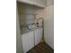 Functional laundry room with washer and dryer, offering convenience and organization at 2307 Butterfly Palm Way # 201, Kissimmee, FL 34747