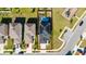 Birds eye view of a home with solar panels, a pool, and backyard with boundary lines at 1134 Forest Gate Cir, Haines City, FL 33844