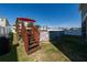 Backyard featuring an above ground pool with a deck, perfect for outdoor enjoyment at 1134 Forest Gate Cir, Haines City, FL 33844