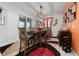 Cozy dining room featuring a modern light fixture and elegant decor at 1134 Forest Gate Cir, Haines City, FL 33844