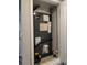Enclosed HVAC system featuring modern climate control unit with visible connections and labeling at 1134 Forest Gate Cir, Haines City, FL 33844