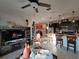 Open layout showcasing seamless flow between kitchen and living spaces at 1134 Forest Gate Cir, Haines City, FL 33844