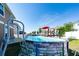Above-ground pool featuring a deck and seating, ideal for summer fun in the sun at 1134 Forest Gate Cir, Haines City, FL 33844