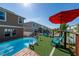 Charming outdoor space with an above-ground pool and comfortable seating area, ideal for enjoying sunny days and evenings at 1134 Forest Gate Cir, Haines City, FL 33844
