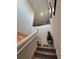 Staircase with carpet runner and bright lighting at 1134 Forest Gate Cir, Haines City, FL 33844