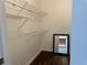 Walk-in closet with shelves and a mirror for added convenience and space at 824 Park Lake Pl # 824, Maitland, FL 32751